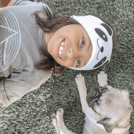 A child wearing CozyPhones
