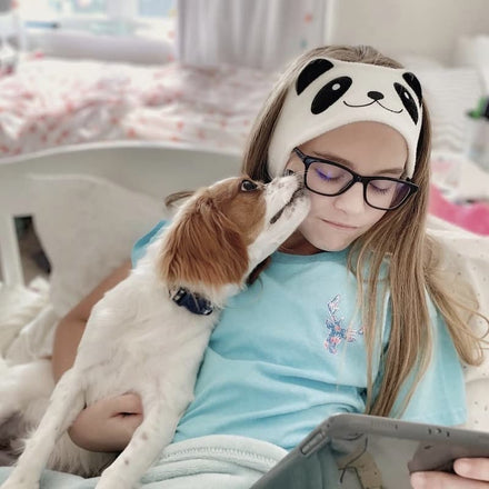 A child wearing CozyPhones