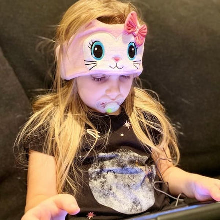 A child wearing CozyPhones