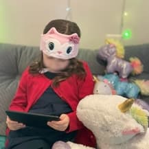 A child wearing CozyPhones